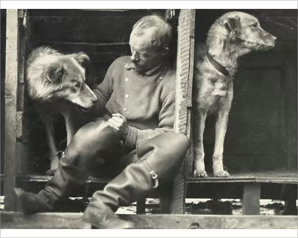 Frank Wild and sledge dogs on board ship