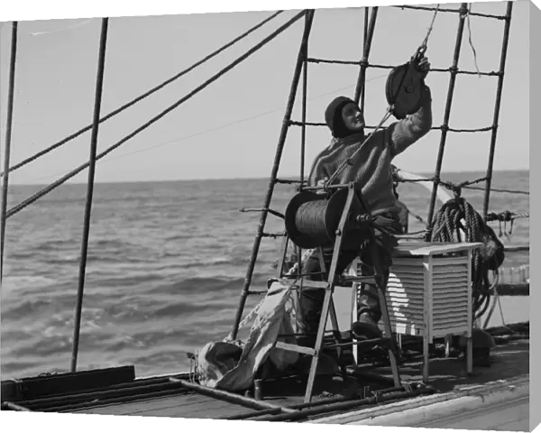 Dennis Lillie at the water bottle winch. January 1st 1911
