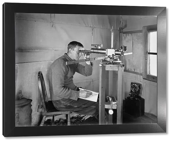 Dr Simpson at work in the Magnetic Hut at Winterquarters. January 5th 1911