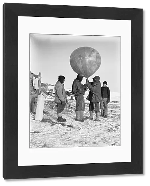 Dr Simpson inflating one of his balloons. April 7th 1911