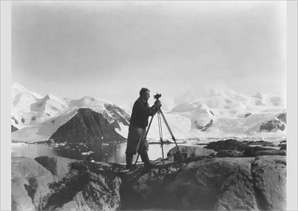 Alfred Stephenson with theodolite, Anchorage Island