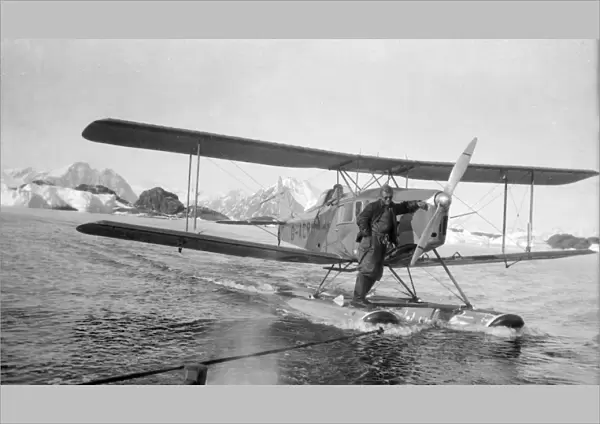 Debenham Islands, plane being towed on floats, April 1936