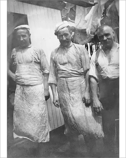 Three unidentified expedition members