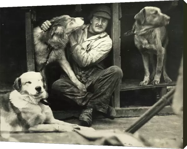 Dr Macklin with sledge dogs on board ship