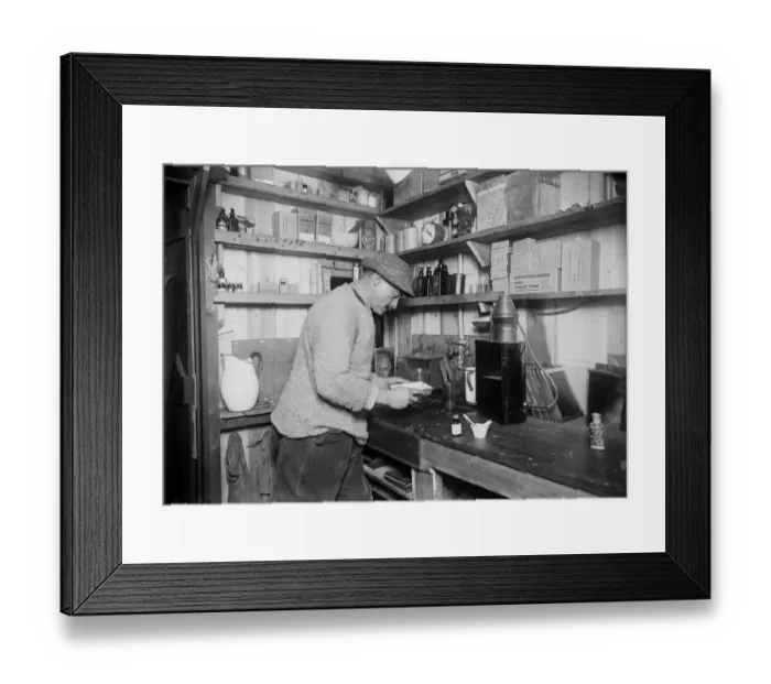 Framed Print : Herbert Ponting at work in darkroom. March 24th 1911