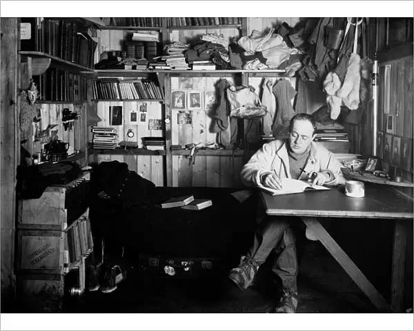 Capt Scott writing his journal in the Winterquarters Hut. October 7th 1911