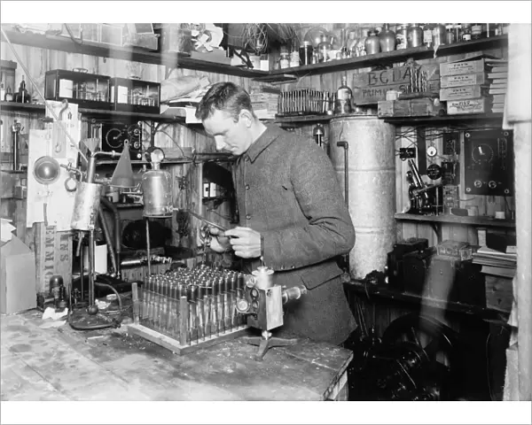 Dr Simpson in his laboratory, at the Winterquarters Hut. December 21st 1911