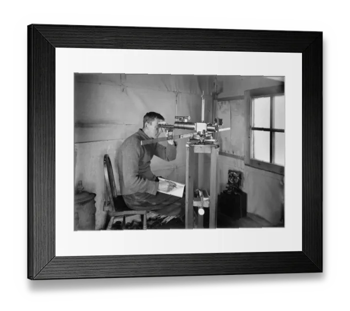 Framed Print : Dr Simpson at work in the Magnetic Hut at Winterquarters. January 5th 1911 Framed Print : Dr Simpson at work in the Magnetic Hut at Winterquarters. January 5th 1911