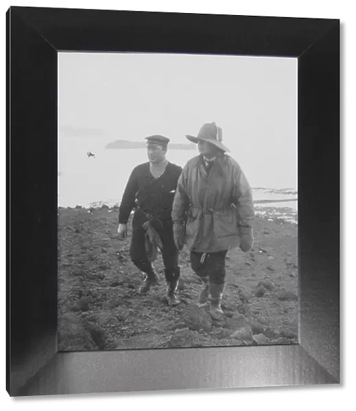 Capts Scott and Colbeck climbing on Island in McMurdo Strait