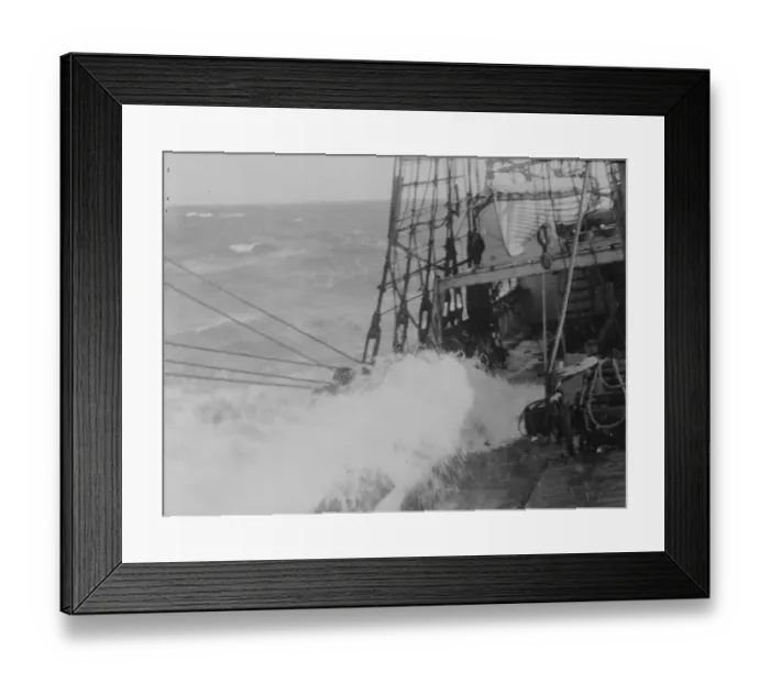 Framed Print : Heavy weather. Waves washing over the deck of the ship