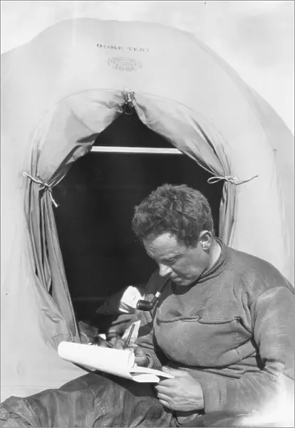 George Murray Levick sitting at entrance to a tent