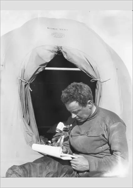 George Murray Levick sitting at entrance to a tent