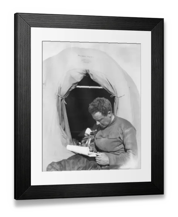 Framed Print : George Murray Levick sitting at entrance to a tent Framed Print : George Murray Levick sitting at entrance to a tent