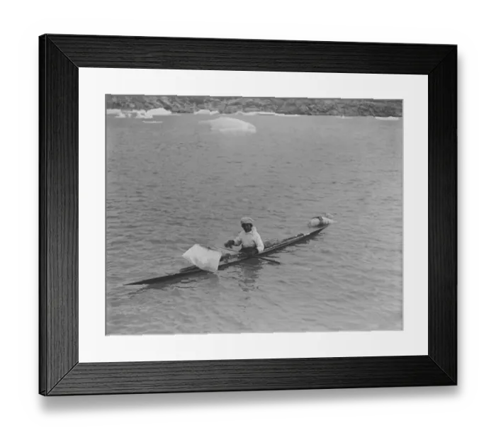 Framed Print : Jamesi in a kayak towing seal Framed Print : Jamesi in a kayak towing seal