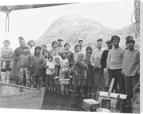 Group of Inuit people on board Quest