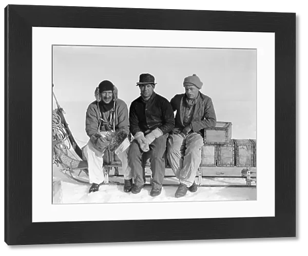 Lindsay, Scott and Stephenson, sitting on sledge, Ivigtut journey