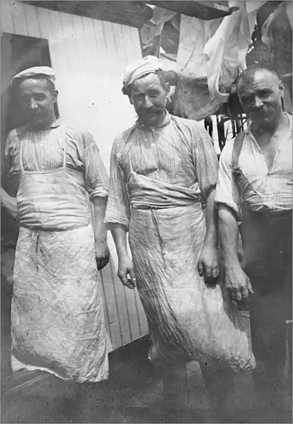 Three unidentified expedition members
