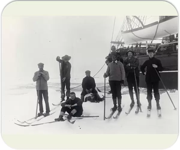 Group of officers on floe alongside ship in pack ice