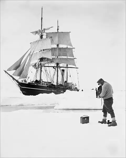 Ponting photographing the Terra Nova in the pack, December 1910
