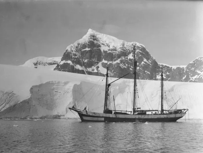 Framed Print : Penola in Port Lockroy. Luigi di Savola Peak in background Framed Print : Penola in Port Lockroy. Luigi di Savola Peak in background