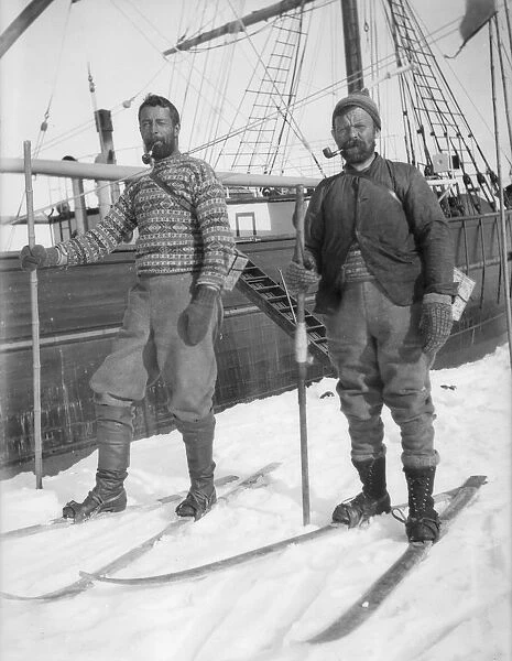 Two unidentified expedition members on skis
