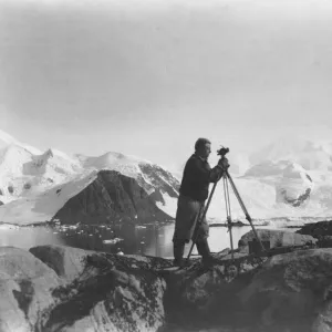 Alfred Stephenson with theodolite, Anchorage Island