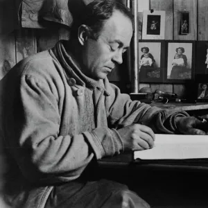 Capt Scott writing his journal in the Winterquarters Hut