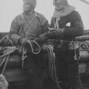 Dr Davidson and Lt Evans going sledging. The Drs tights were an experiment and were