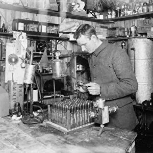Dr Simpson in his laboratory, at the Winterquarters Hut. December 21st 1911