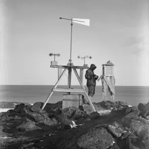 Dr Simpson taking observations on Vane Hill. March 1911