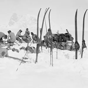 Foundering in soft snow: Bowers sledge team; Wilson pushing; Oates and PO Evans repairing