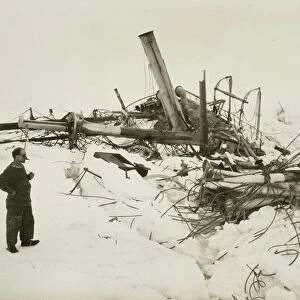 Frank Wild examining the wreckage of the Endurance
