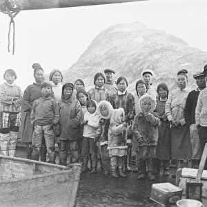 Group of Inuit people on board Quest