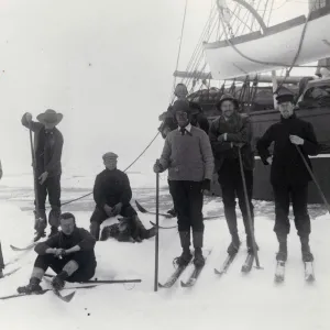 Group of officers on floe alongside ship in pack ice