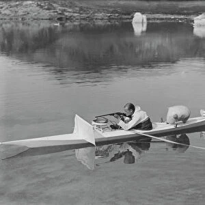 H. G. (Gino) Watkins shooting from kayak