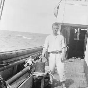 Print of Leonard D. A. Hussey on the Quest ship deck Print of Leonard D. A. Hussey on the Quest ship deck