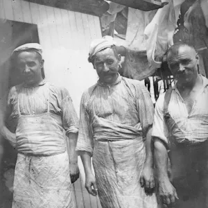 Three unidentified expedition members