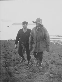 Antarctic Relief Expeditions 1902-04 Gallery: Capts Scott and Colbeck climbing on Island in McMurdo Strait