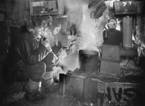 Cecil Meares and Capt Oates at the blubber stove, cooking food for the dogs. May 26th 1911 Cecil Meares and Capt Oates at the blubber stove, cooking food for the dogs. May 26th 1911