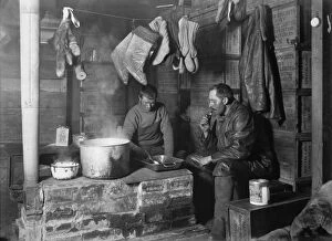 British Antarctic Expedition 1910-13 (Terra Nova) Collection: Cecil Meares and Dimitri Geroff at the blubber stove in the Discovery Hut at Hut Point