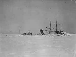 Antarctic Relief Expeditions 1902-04 Gallery: Coaling from the glacier, Mornings masts showing above the ice