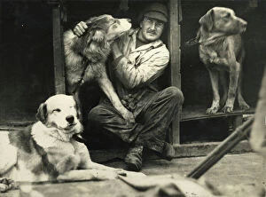 Dr Macklin with sledge dogs on board ship
