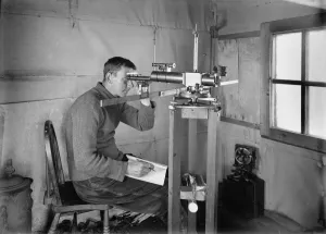 British Antarctic Expedition 1910-13 (Terra Nova) Prints: Dr Simpson at work in the Magnetic Hut at Winterquarters. January 5th 1911