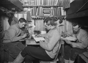 Griffith Taylor, Frank Debenham and Tryggve Gran in their Cubicle. May 18th 1911 Griffith Taylor, Frank Debenham and Tryggve Gran in their Cubicle. May 18th 1911