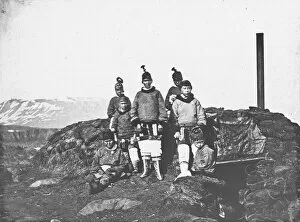: Group of Inuit people on shore