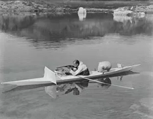 British Arctic Air Route Expedition 1930-31 Gallery: H. G. (Gino) Watkins shooting from kayak