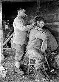 British Antarctic Expedition 1910-13 (Terra Nova) Gallery: Haircutting, Anton Omelchenko and patrick Keohane. January 29th 1912