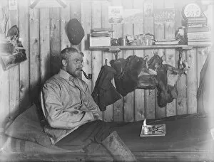 George Murray Levick Gallery: Harry Dickason, sitting on his bunk