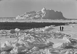 British Antarctic Expedition 1910-13 (Terra Nova) Gallery: Iceberg in pack ice. Tryggve Gran and Thomas McLeod on ice. December 20th 1910