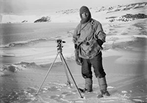 British Antarctic Expedition 1910-13 (Terra Nova) Gallery: Lt Edward Evans and one of the sledging theodolites, (Barne Glacier in the background). October 1911
